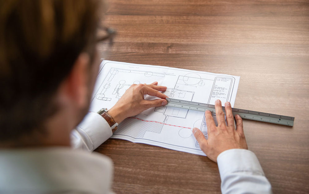 Surveyors drawing floor plan